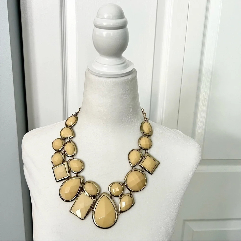 Cream colored faceted bead statement dramatic bib necklace on gold tone chain